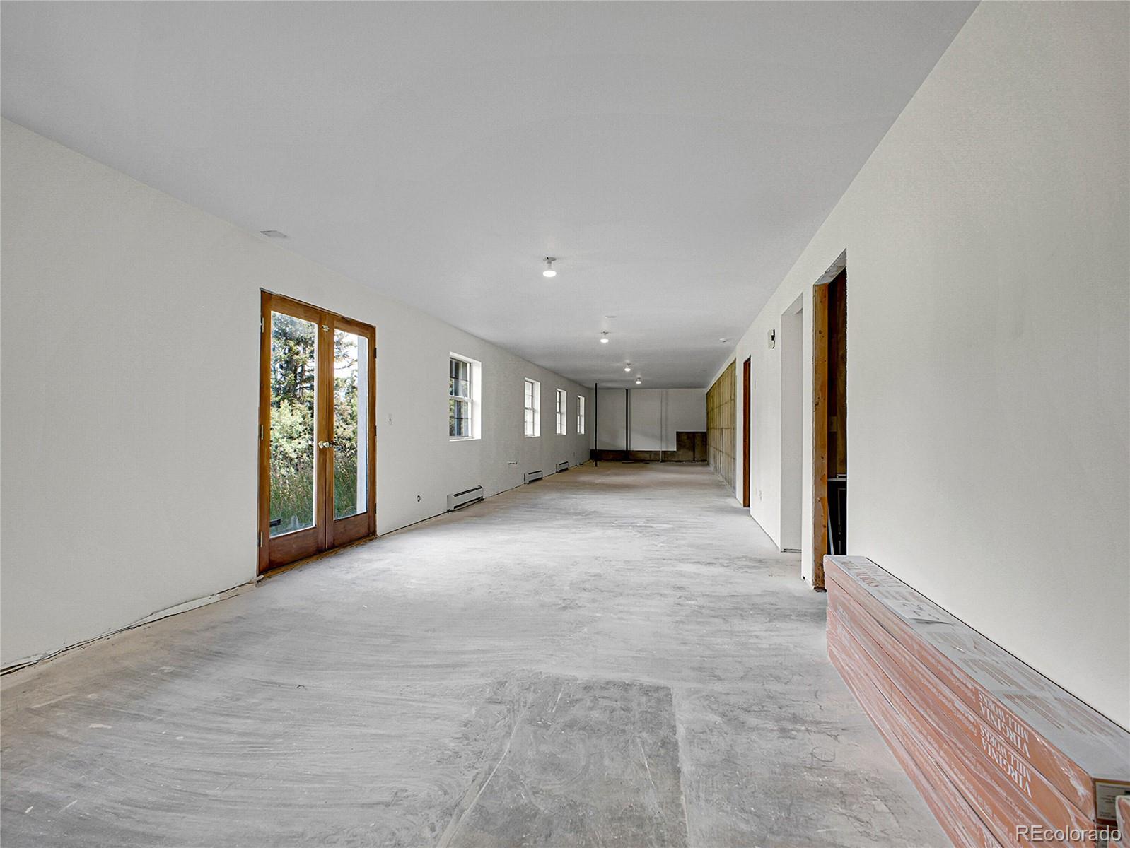 2635 Nova Road Pine, CO 80470 - Photo 36 of 45 a view of empty room with windows