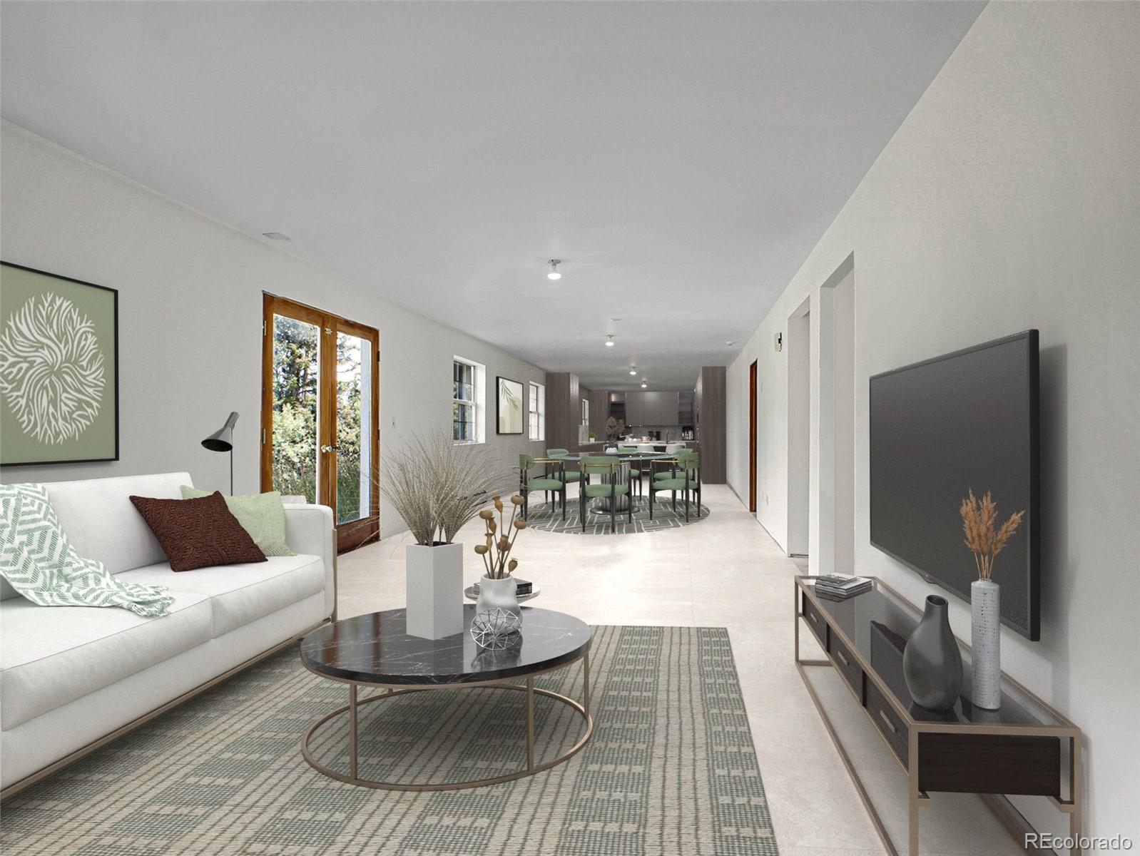 2635 Nova Road Pine, CO 80470 - Photo 37 of 45 a living room with fireplace furniture and a flat screen tv