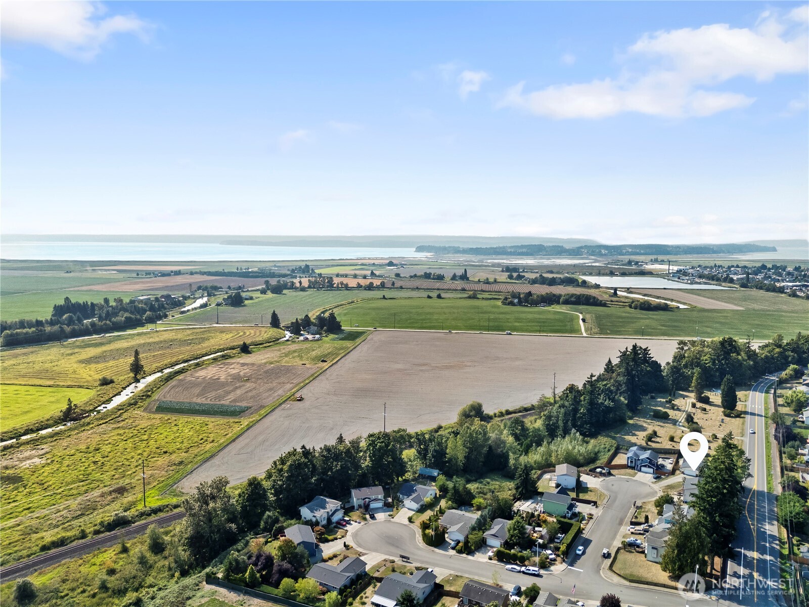 7805 260th Street Northwest Stanwood, WA 98292 - Photo 23 of 25 a view of a city and lake view