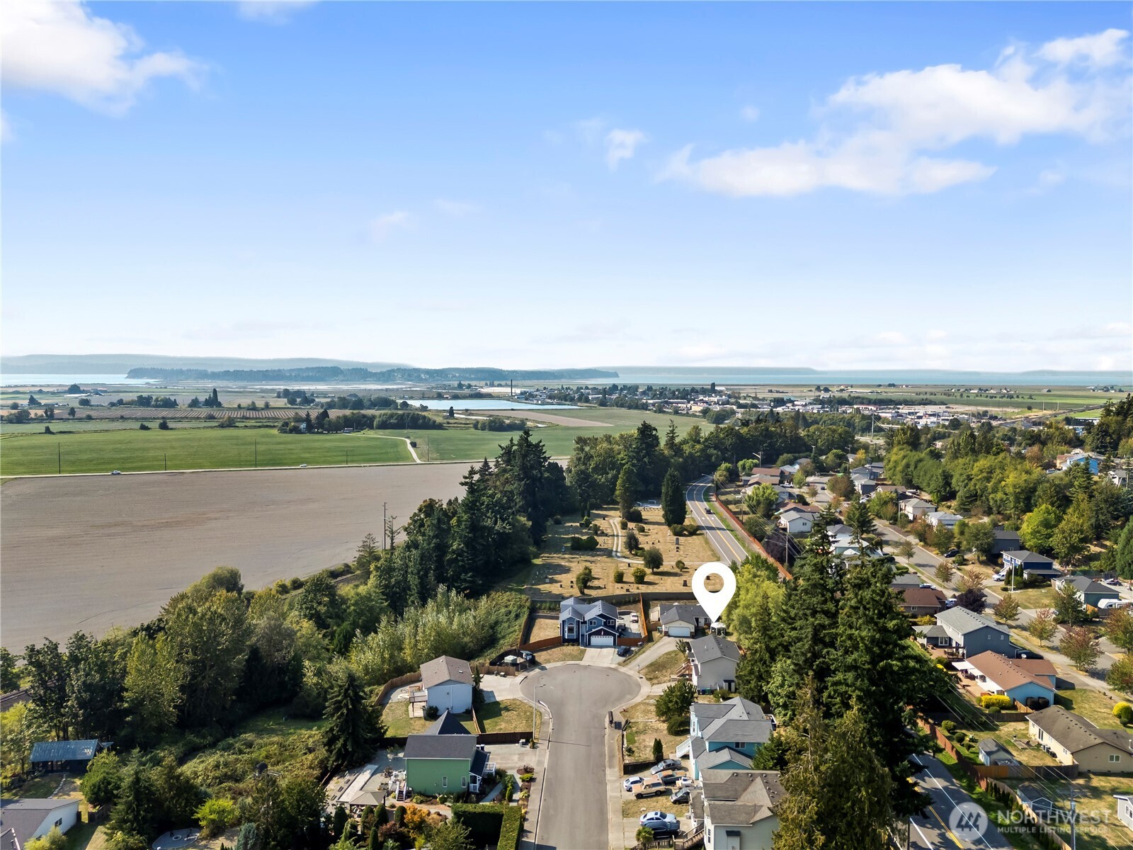 7805 260th Street Northwest Stanwood, WA 98292 - Photo 24 of 25 an aerial view of a city with lots of residential buildings