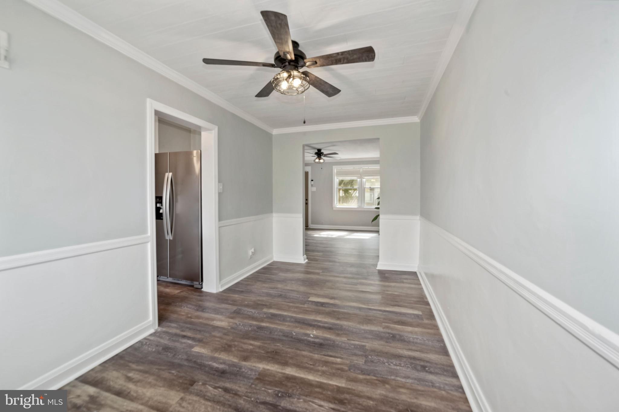 310 Grove Park Road Brooklyn, MD 21225 - Photo 6 of 22 Dining Room leads to Kitchen and Family Room