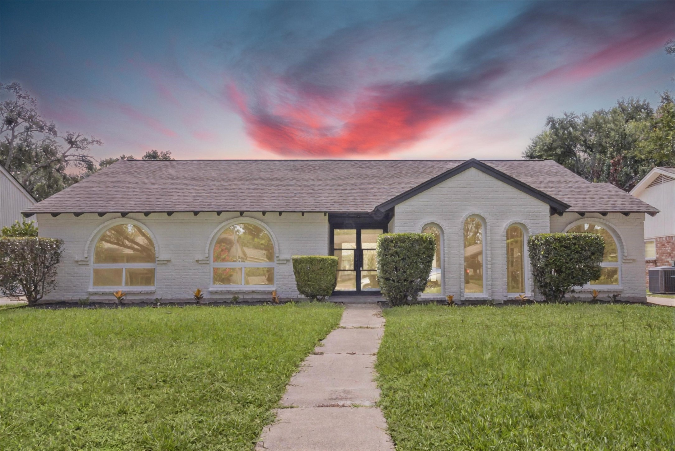 2823 Stetson Lane Houston, TX 77043 - Photo 1 of 19 a front view of a house with garden