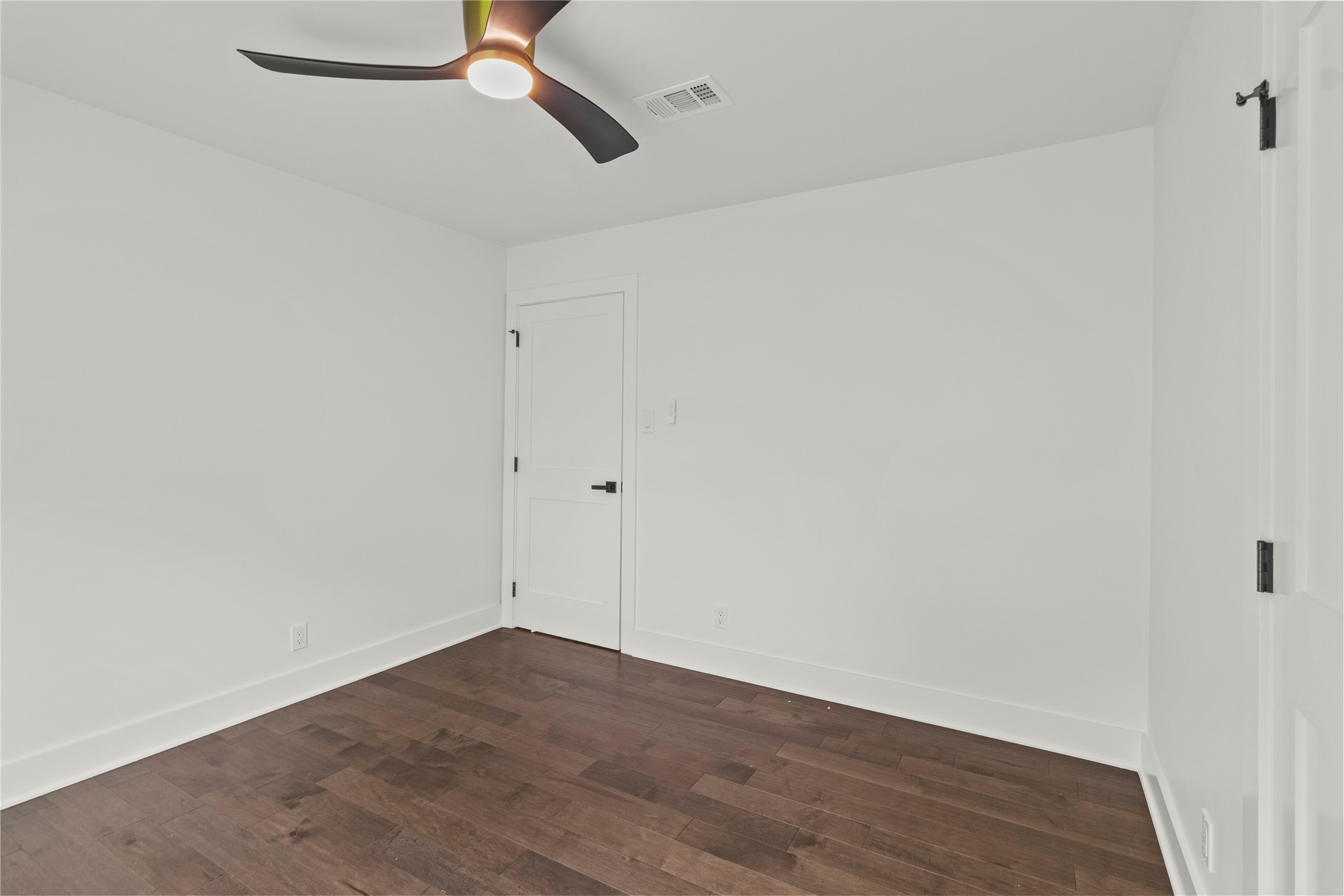 2823 Stetson Lane Houston, TX 77043 - Photo 14 of 19 a view of small space with wooden floor