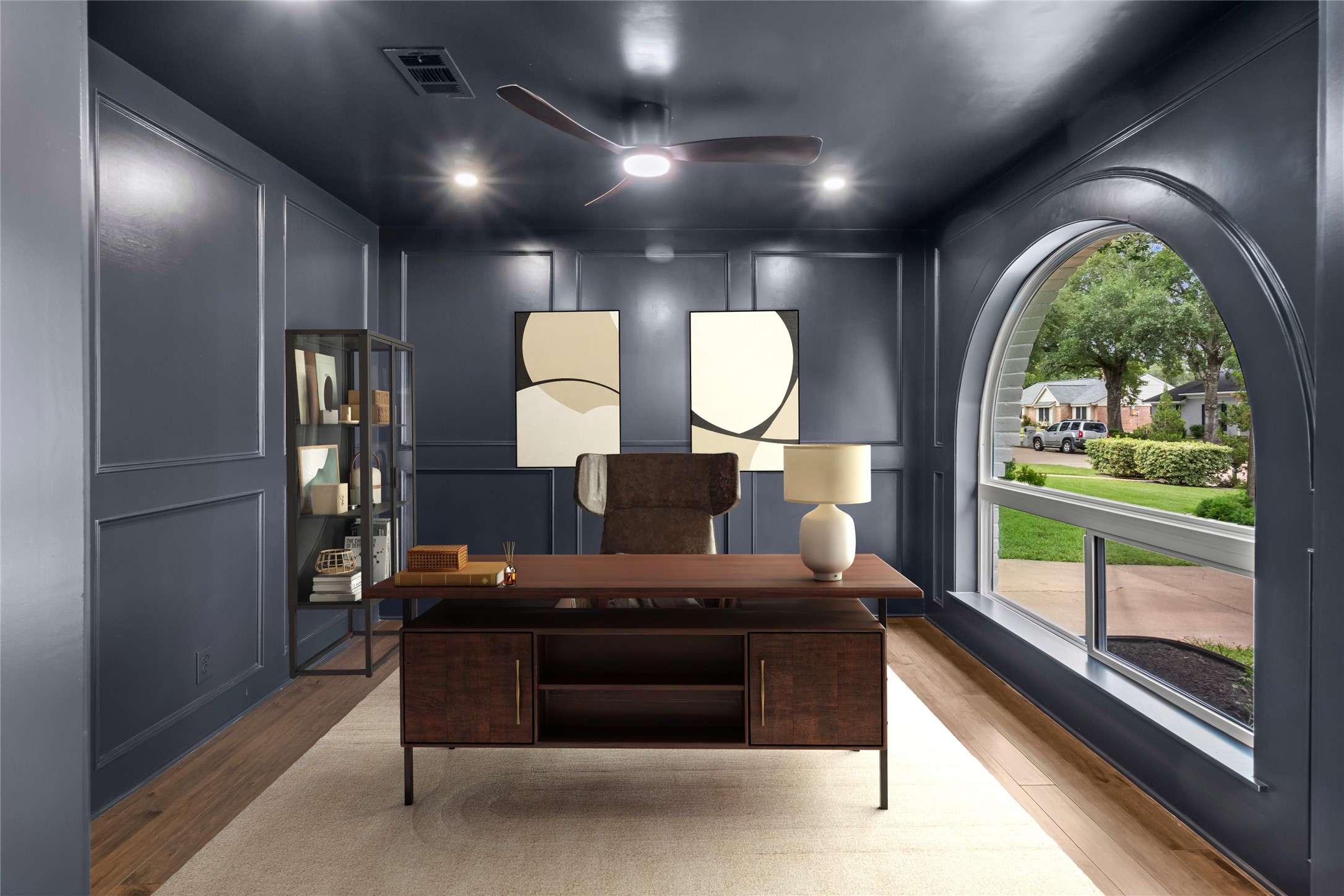 2823 Stetson Lane Houston, TX 77043 - Photo 6 of 19 a room with furniture and a large window