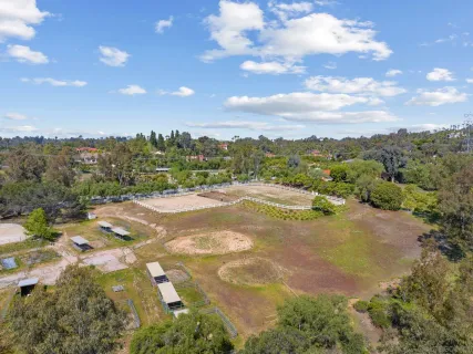 a view of a city with mountains in the background