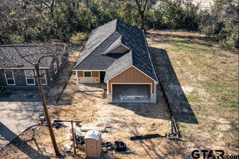 1722 North Ross Avenue Tyler, TX 75702 - Photo 4 of 4 a pathway of a house with wooden fence