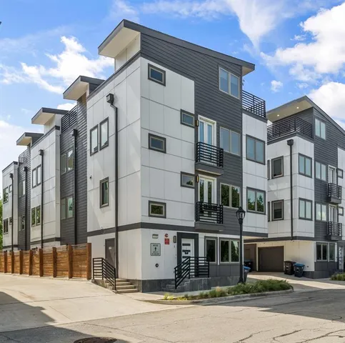 a front view of a building and a street