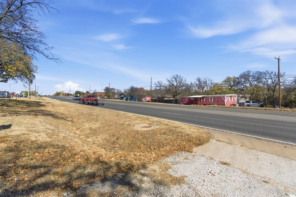 2410 State Highway South Graham, TX 76450 - Photo 15 of 19 a city view with large trees