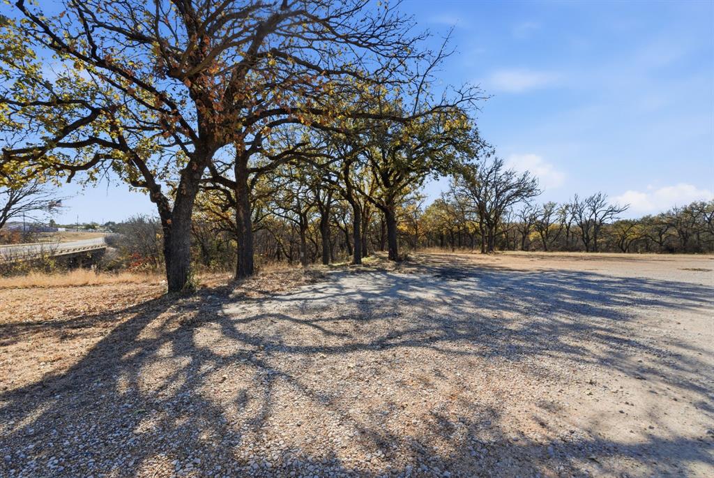 2410 State Highway South Graham, TX 76450 - Photo 16 of 19 a view of outdoor space with lots of trees