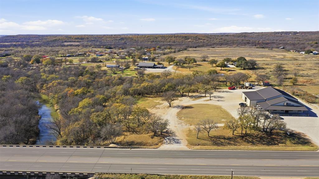 2410 State Highway South Graham, TX 76450 - Photo 3 of 19 an aerial view of residential houses with outdoor space