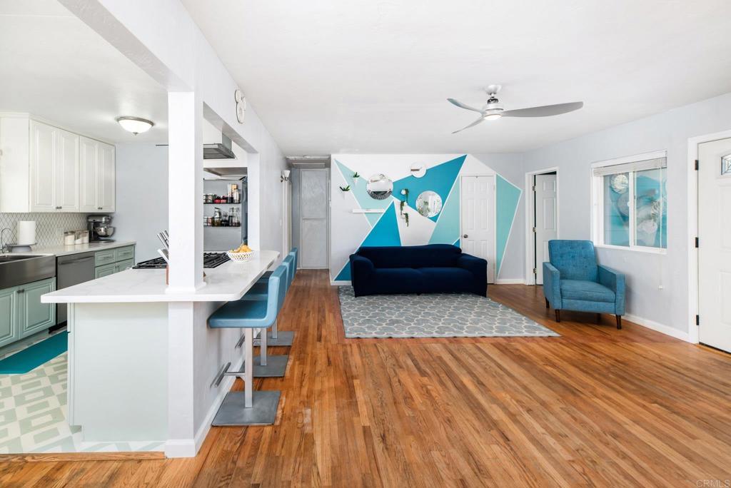 2914 Rosedale Court Spring Valley, CA 91977 - Photo 11 of 30 a living room with furniture and a wooden floor