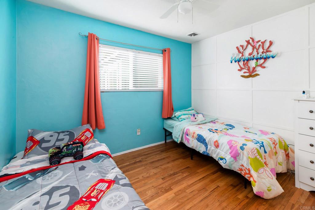 2914 Rosedale Court Spring Valley, CA 91977 - Photo 19 of 30 a bedroom with a bed and a window