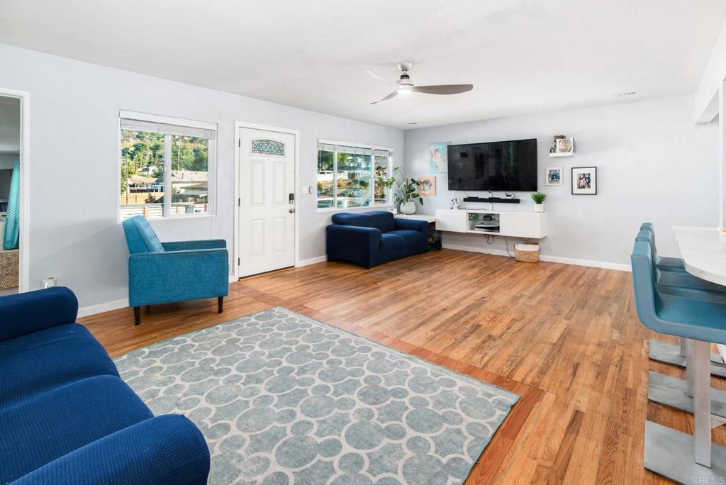 2914 Rosedale Court Spring Valley, CA 91977 - Photo 2 of 30 a bedroom with furniture and a flat screen tv