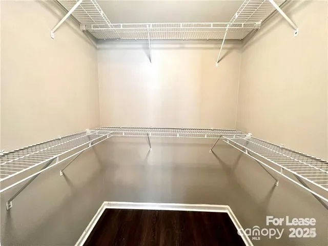 a view of a room with racks on the wall