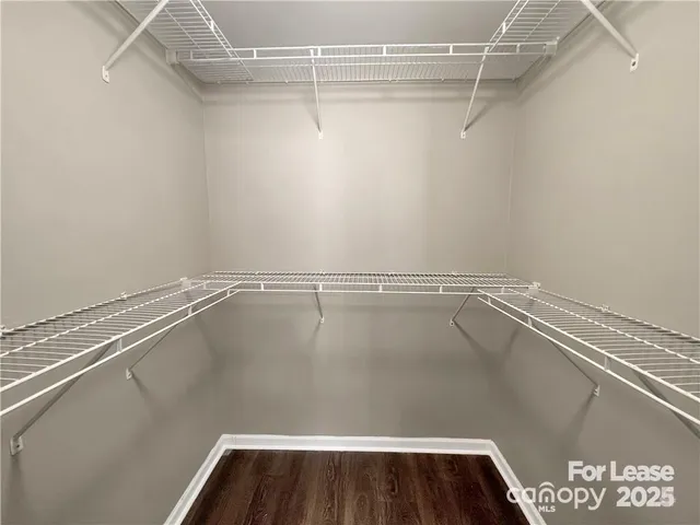 a view of a room with racks on the wall