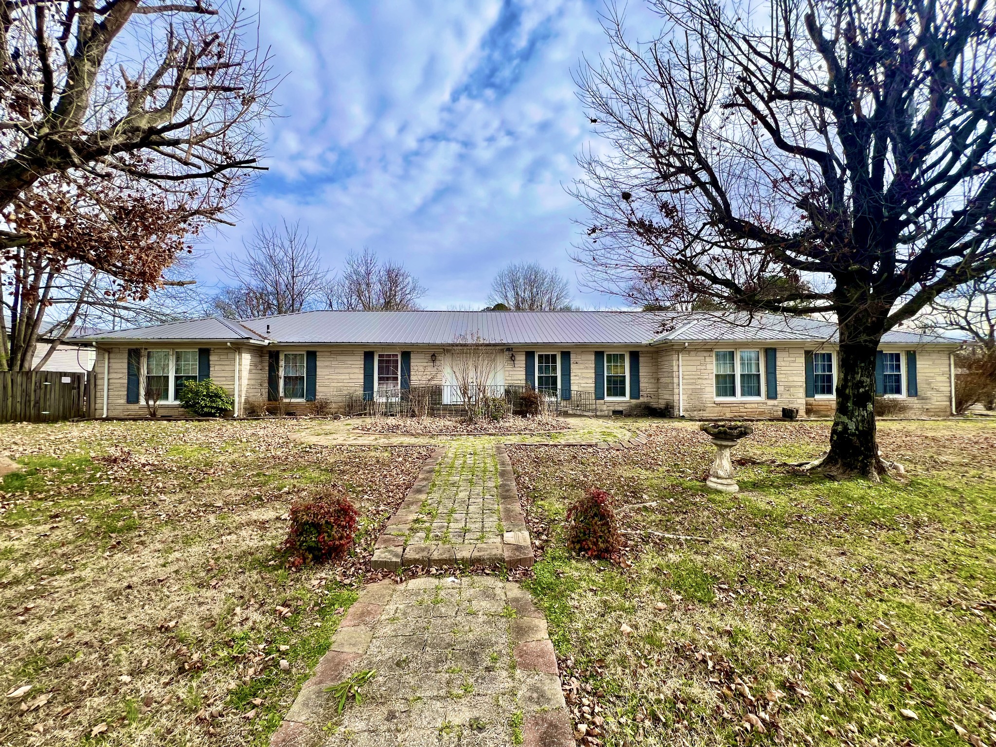 1100 Buffalo Road Lawrenceburg, TN 38464 - Photo 1 of 56 a front view of a house with a yard