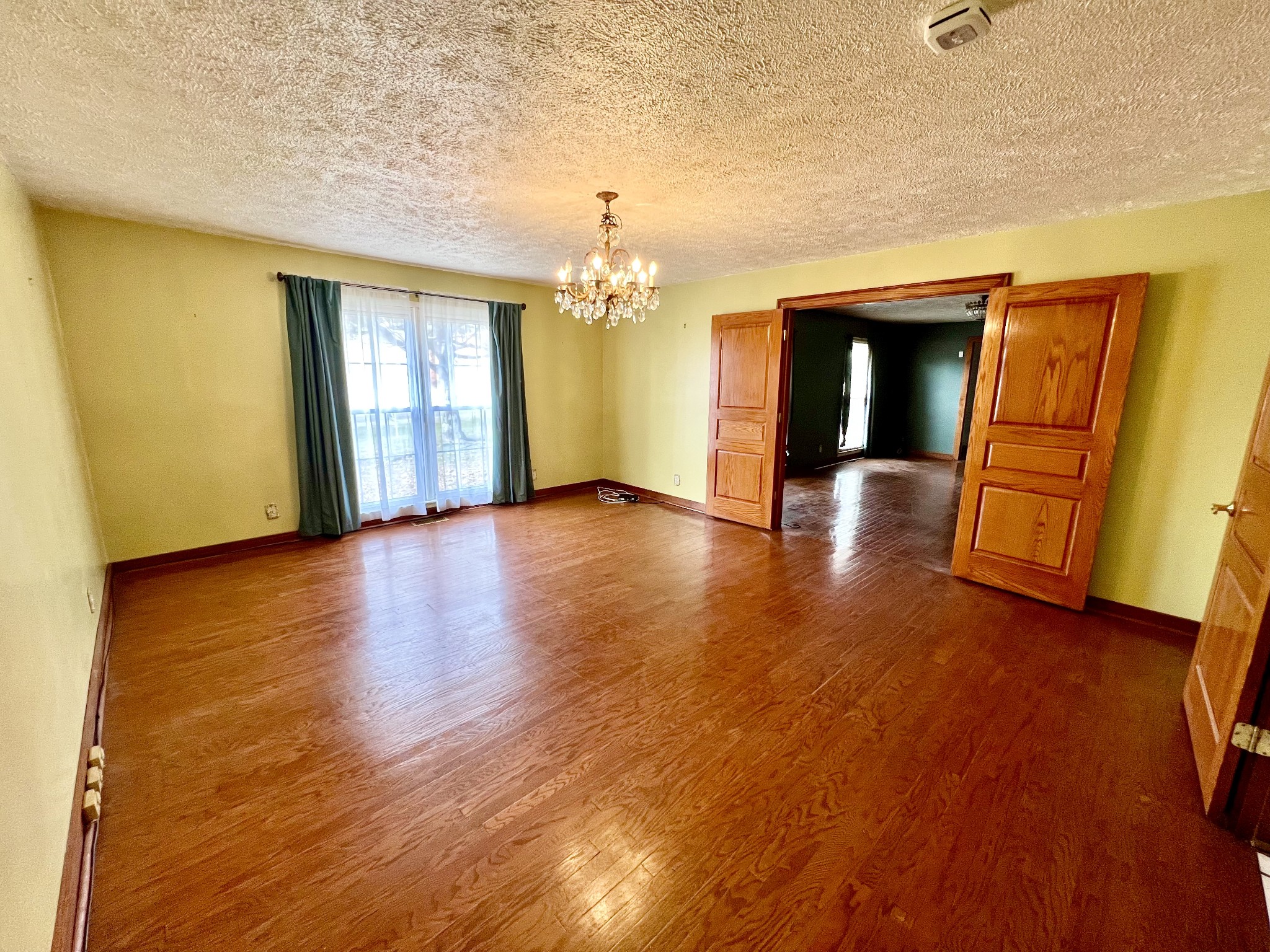 1100 Buffalo Road Lawrenceburg, TN 38464 - Photo 17 of 56 wooden floor in an empty room