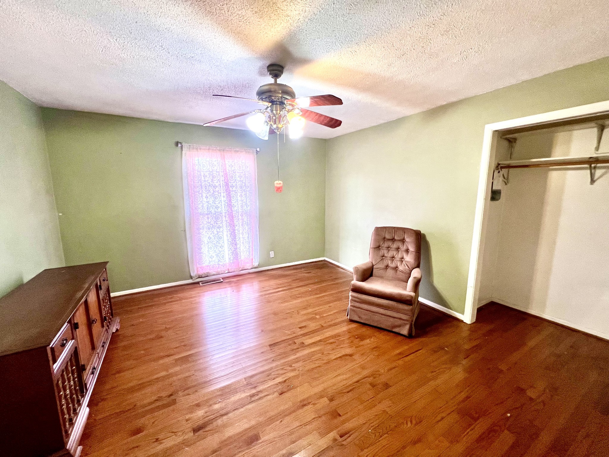 1100 Buffalo Road Lawrenceburg, TN 38464 - Photo 32 of 56 a living room with furniture and a wooden floor