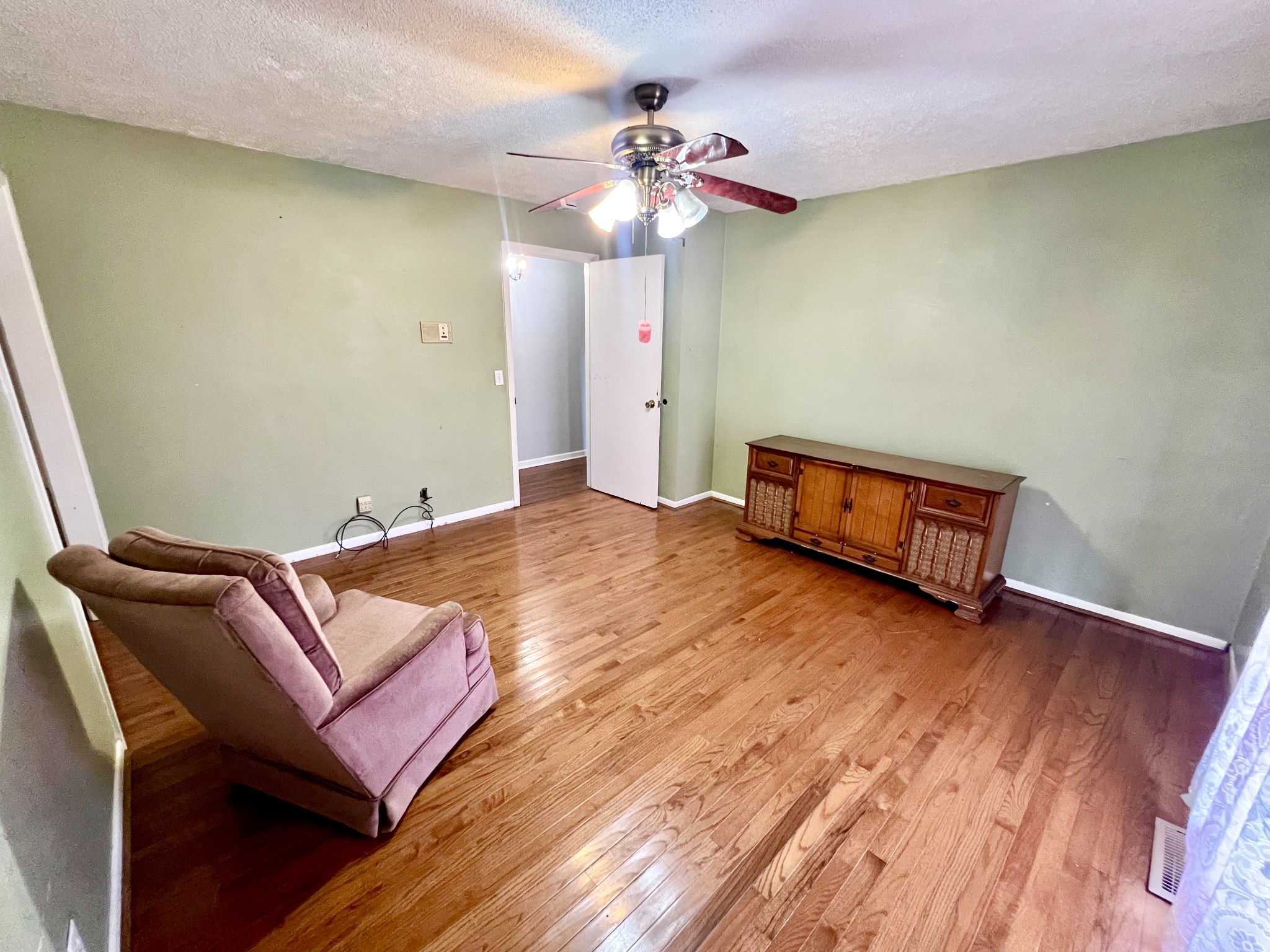 1100 Buffalo Road Lawrenceburg, TN 38464 - Photo 35 of 56 a room with wooden floor and staircase