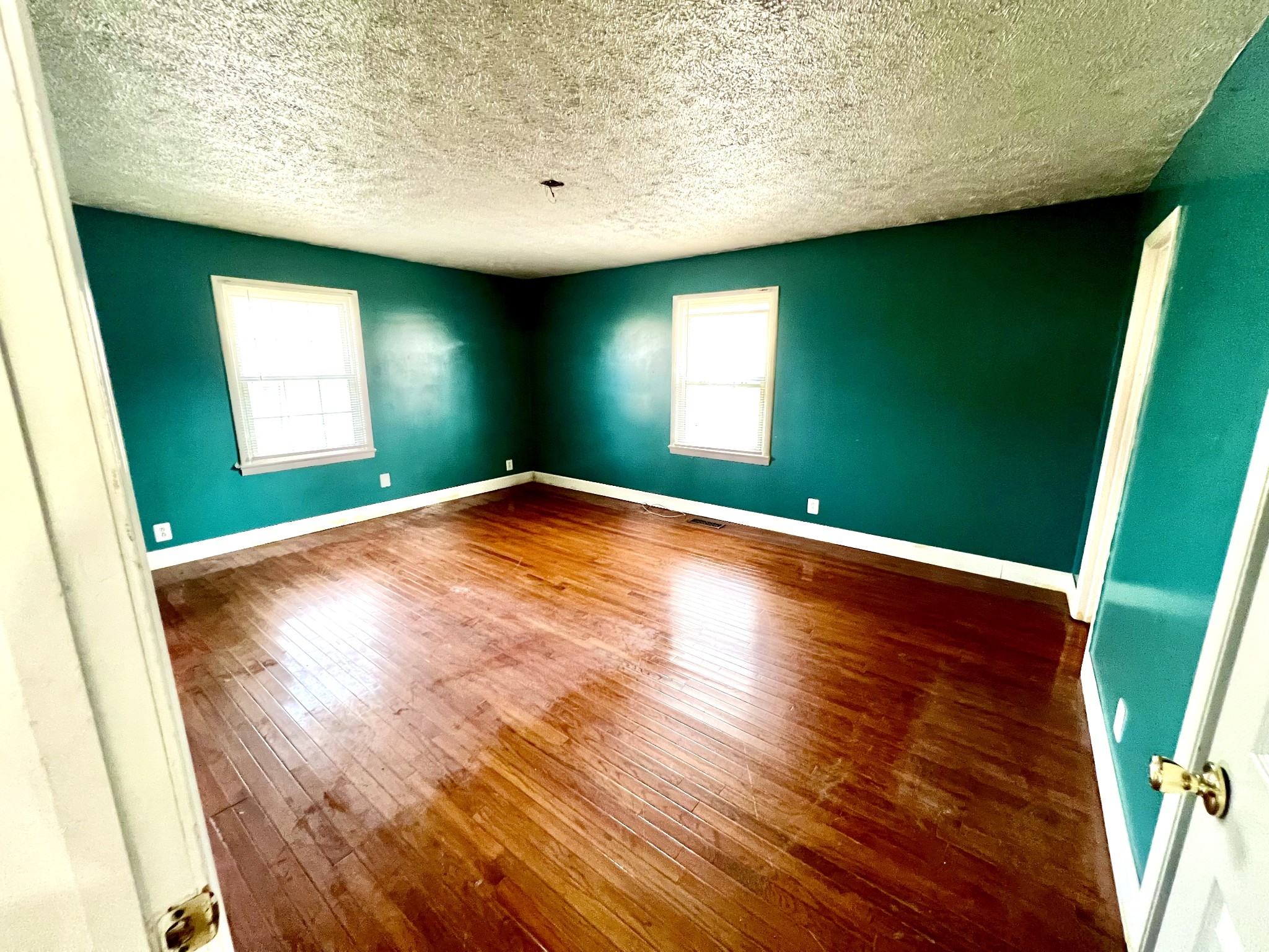 1100 Buffalo Road Lawrenceburg, TN 38464 - Photo 42 of 56 a view of empty room with window and wooden floor