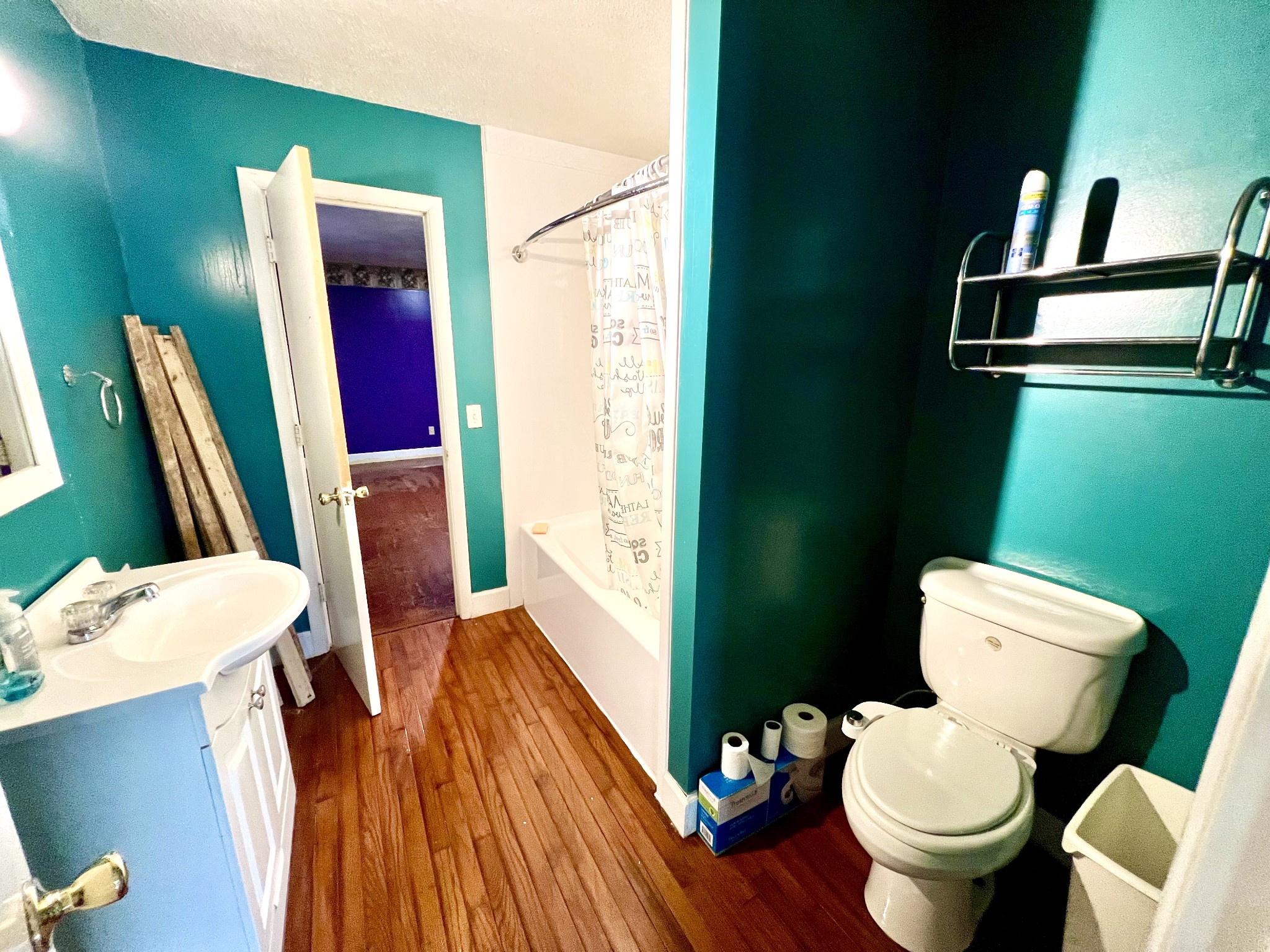 1100 Buffalo Road Lawrenceburg, TN 38464 - Photo 46 of 56 a white toilet sitting next to a bathroom sink