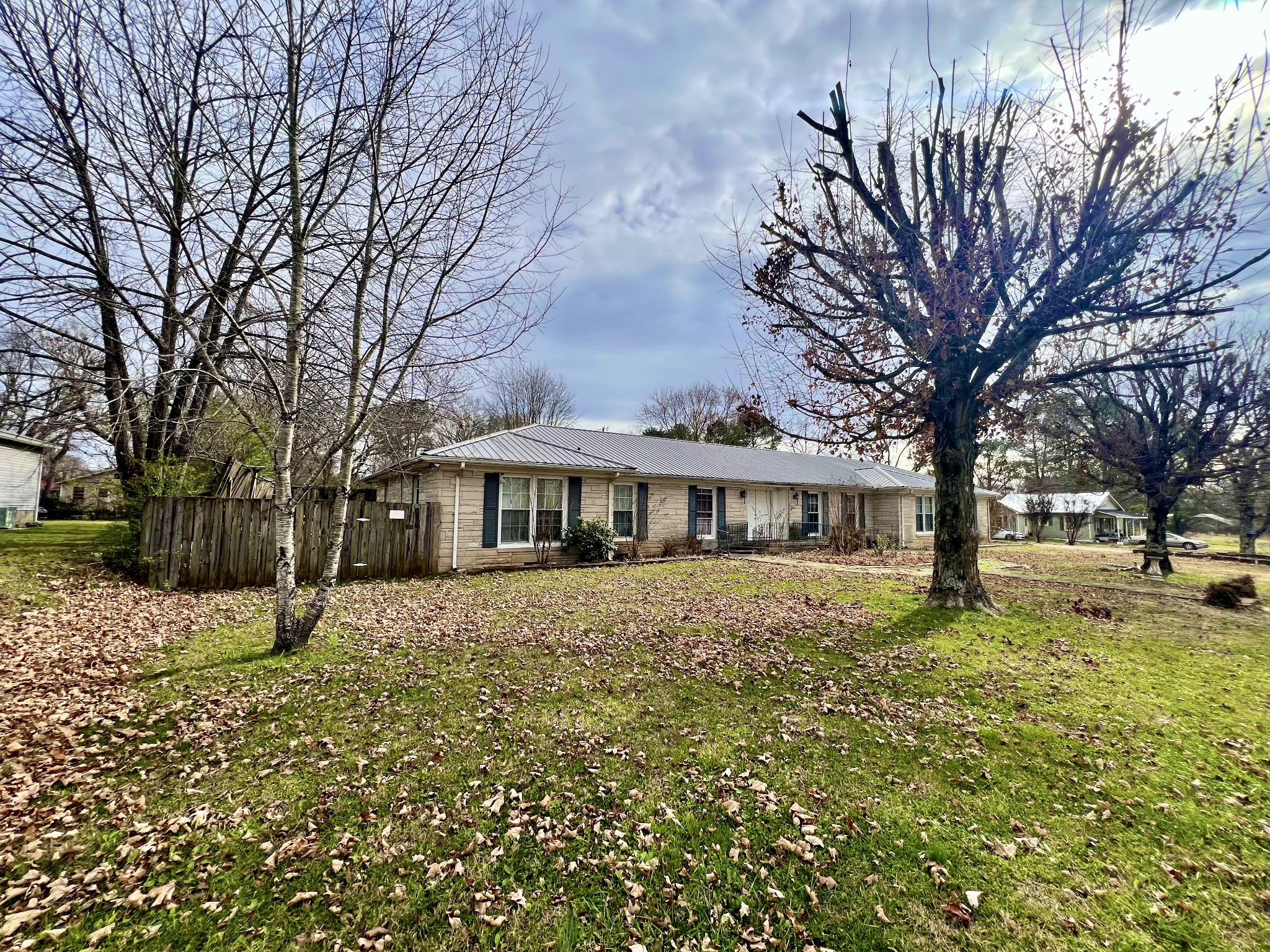 1100 Buffalo Road Lawrenceburg, TN 38464 - Photo 5 of 56 a big house with trees in front of it