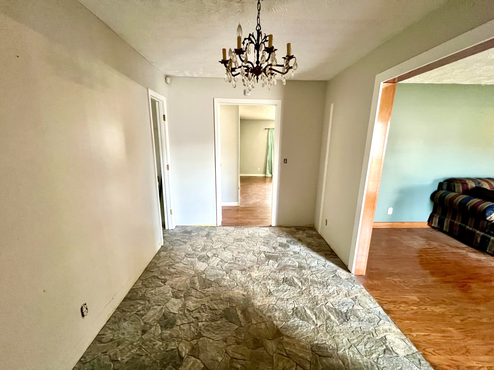 1100 Buffalo Road Lawrenceburg, TN 38464 - Photo 8 of 56 a view of a bedroom with wooden floor and hallway