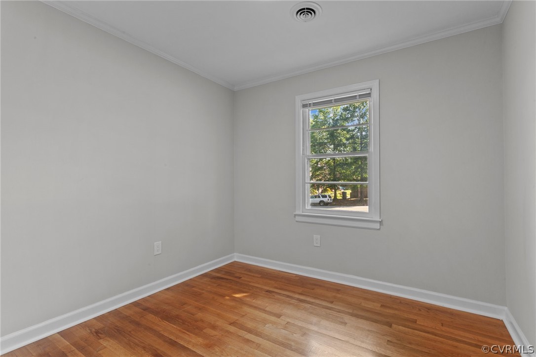3910 Turner Road Chesterfield, VA 23832 - Photo 23 of 37 a view of an empty room with wooden floor and a window