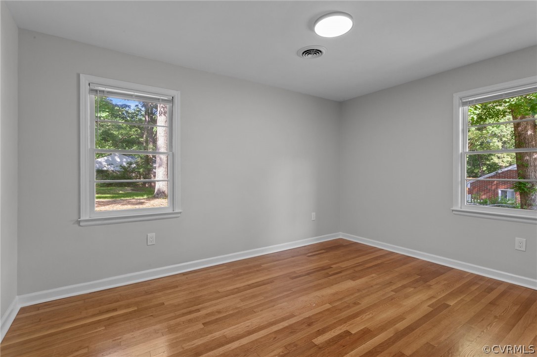3910 Turner Road Chesterfield, VA 23832 - Photo 27 of 37 a view of an empty room with wooden floor and a window