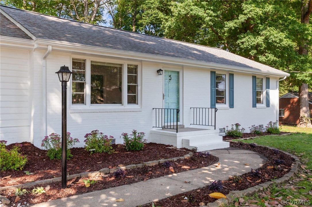 3910 Turner Road Chesterfield, VA 23832 - Photo 5 of 37 a front view of a house with garden