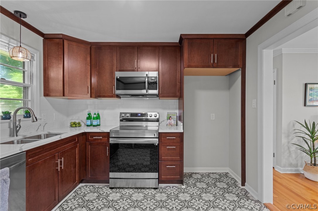 3910 Turner Road Chesterfield, VA 23832 - Photo 10 of 37 a kitchen with stainless steel appliances granite countertop a refrigerator stove top oven a sink and dishwasher