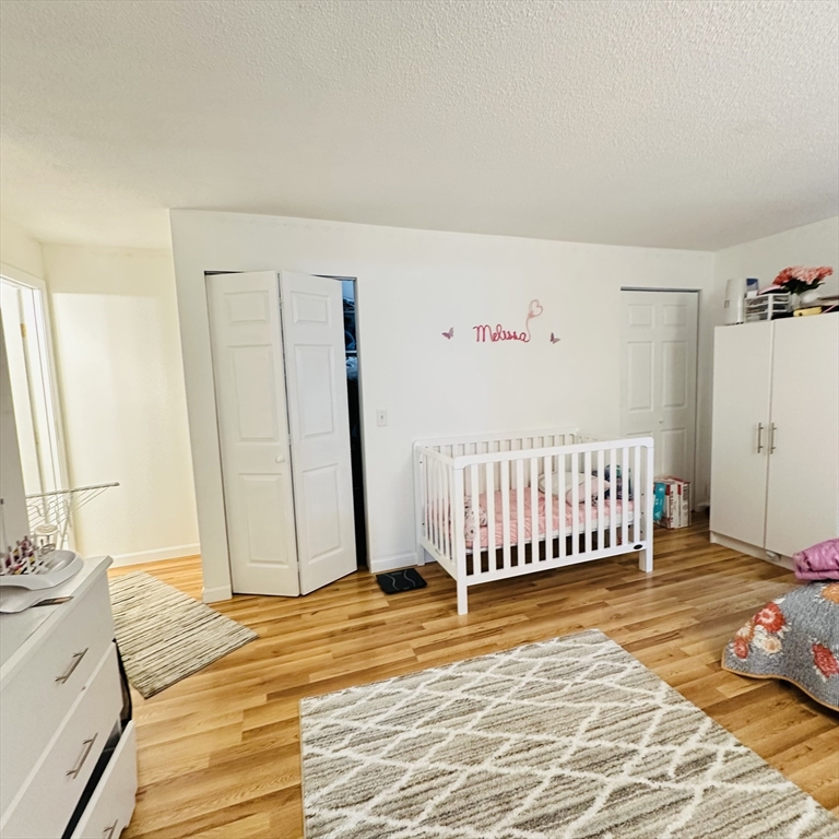 8 Shadowbrook Lane, Unit 38 Milford, MA 01757 - Photo 11 of 16 a view of a bedroom