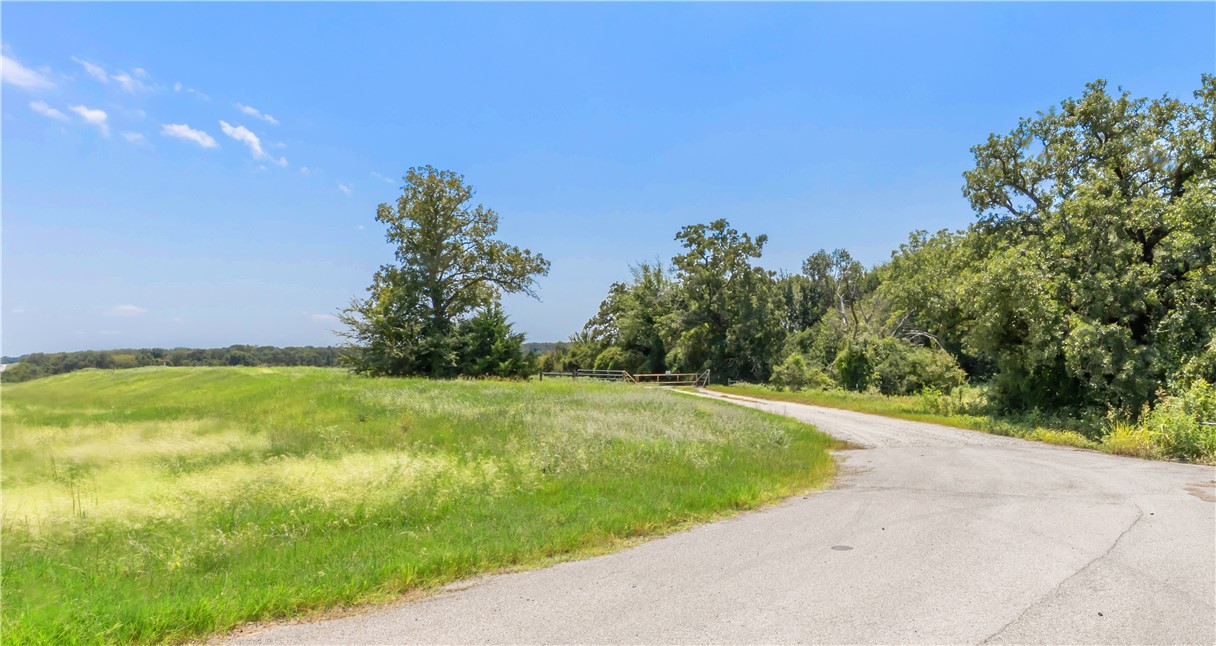 6 Calvert Tx 77837 Calvert, TX 77837 - Photo 2 of 15 View of asphalt street featuring a rural view