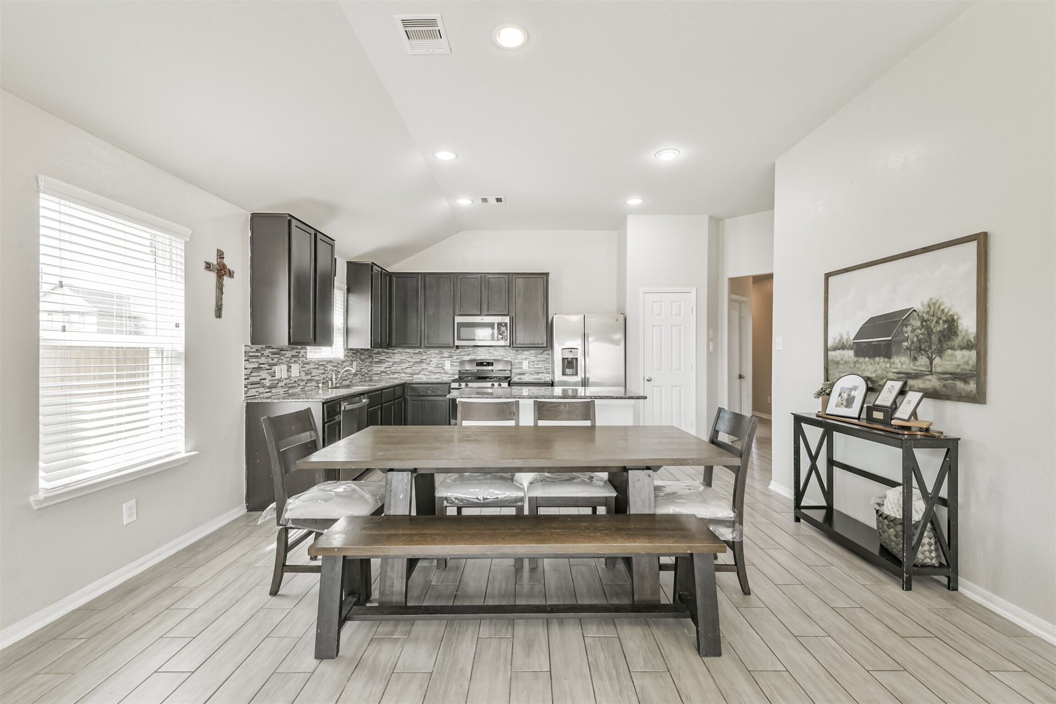 3127 Everwood Trail Rosenberg, TX 77471 - Photo 13 of 23 The dining room opens to the kitchen.