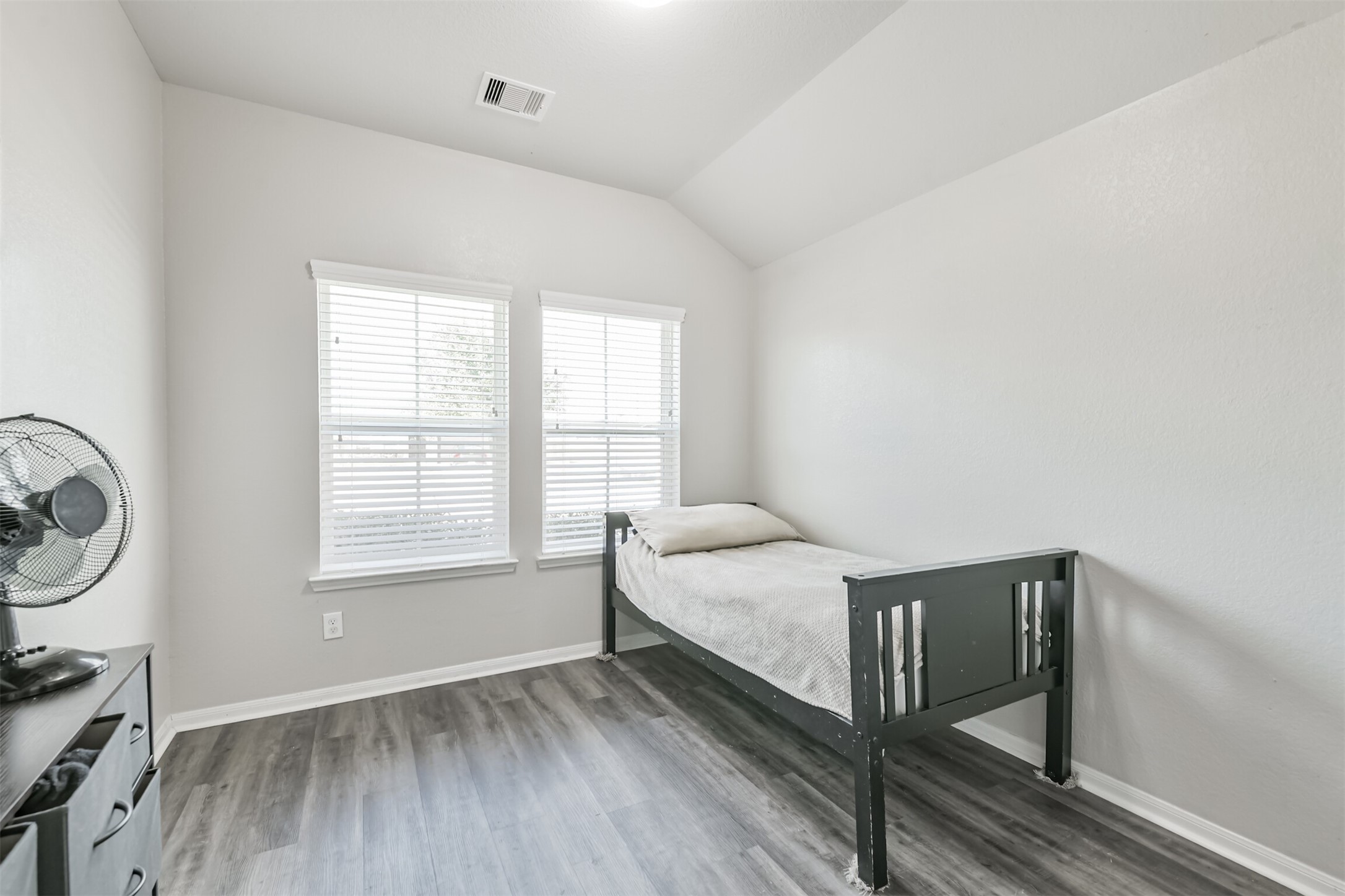 3127 Everwood Trail Rosenberg, TX 77471 - Photo 4 of 23 The first bedroom overlooks the front yard and offers space for chest of drawers a bed and possibly a desk.
