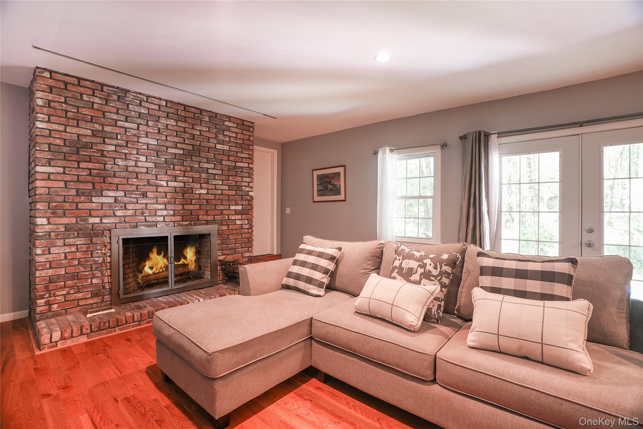 22 Peters Lane Pound Ridge, NY 10576 - Photo 26 of 43 Above grade lower level w/ 2nd wood burning fireplace.