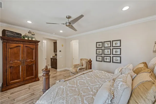 a bathroom with a granite countertop sink a mirror and a bathtub