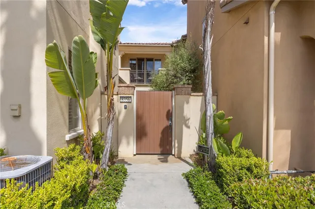 a view of front of a house with a garden