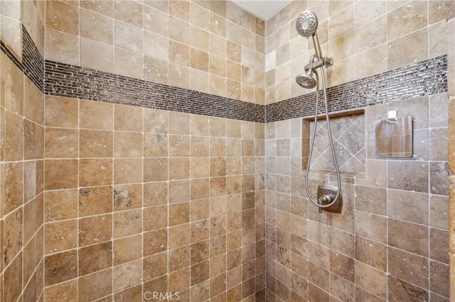a utility room with sink dryer and washer