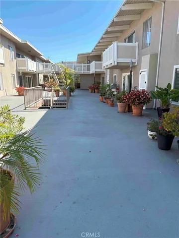 a view of a street with cars