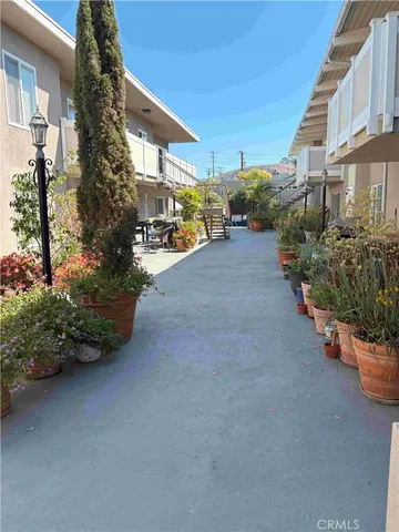 a view of a street with cars