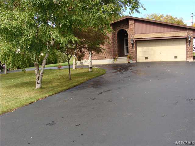 8060 Packard Road Niagara, NY 14304 - Photo 1 of 1 Exterior Front. All Brick Ranch, Circular Driveway