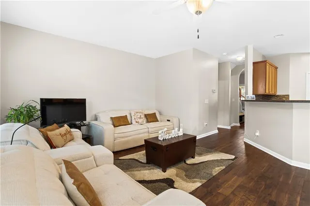 a bedroom with two beds and a window