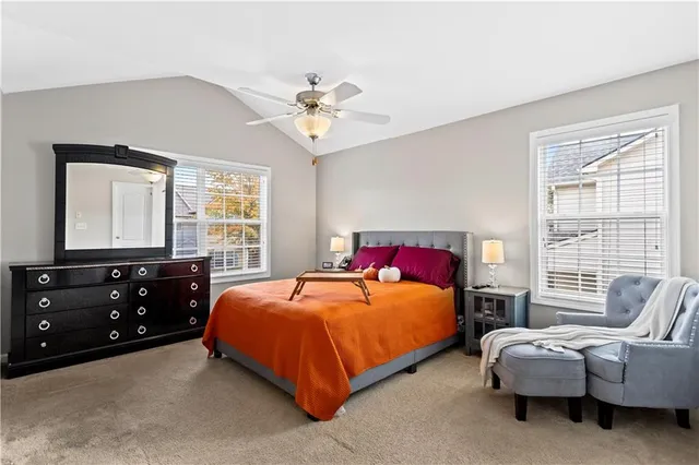 a room with gym equipment and a flat screen tv