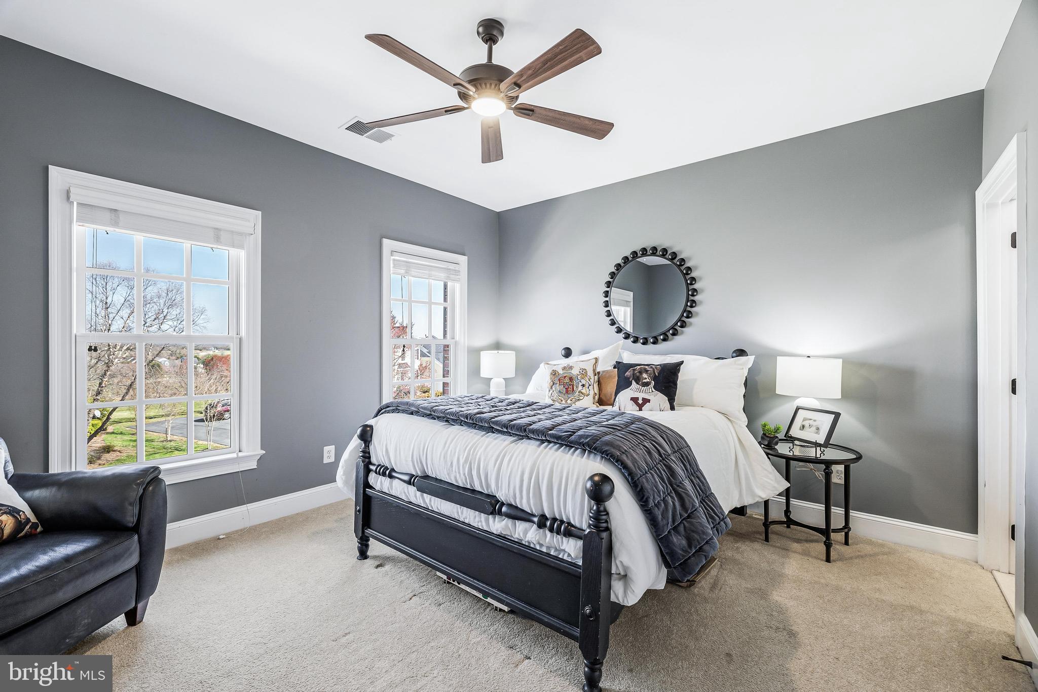 16319 Hunter Place Leesburg, VA 20176 - Photo 34 of 71 a bed room with a bed and a couch