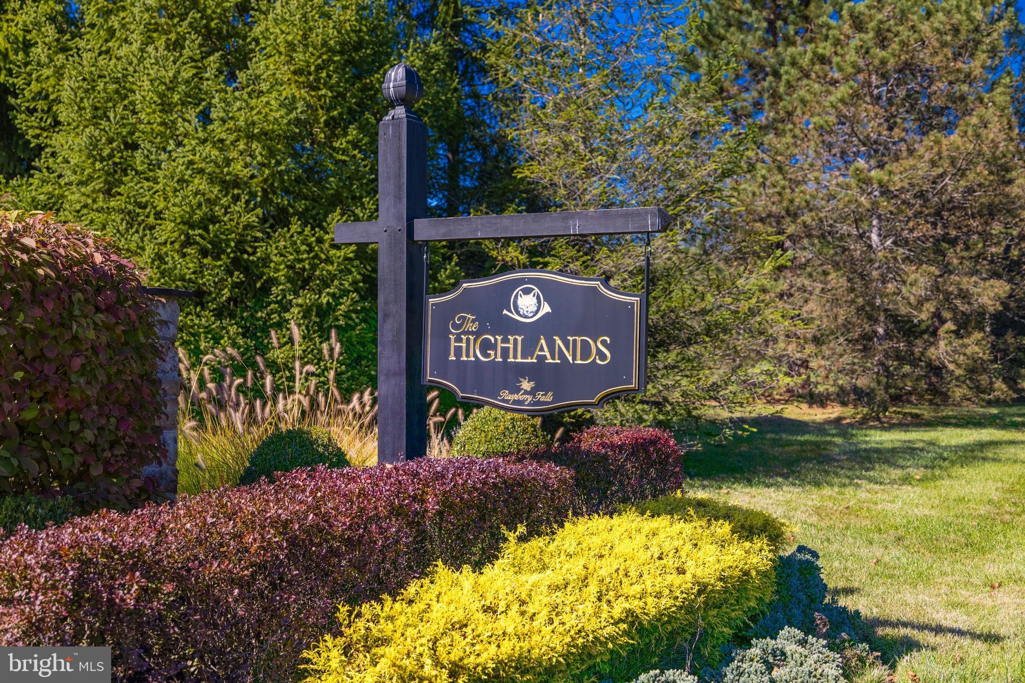 16319 Hunter Place Leesburg, VA 20176 - Photo 64 of 71 a sign that is sitting on a brick wall