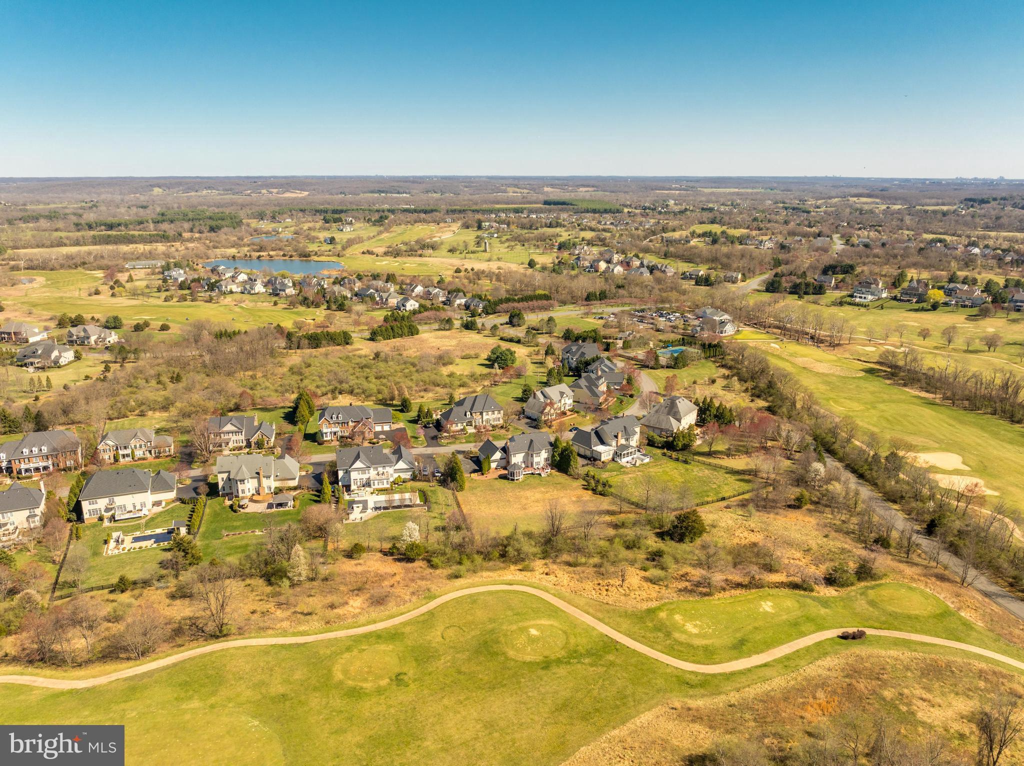 16319 Hunter Place Leesburg, VA 20176 - Photo 66 of 71 an aerial view of residential houses with outdoor space