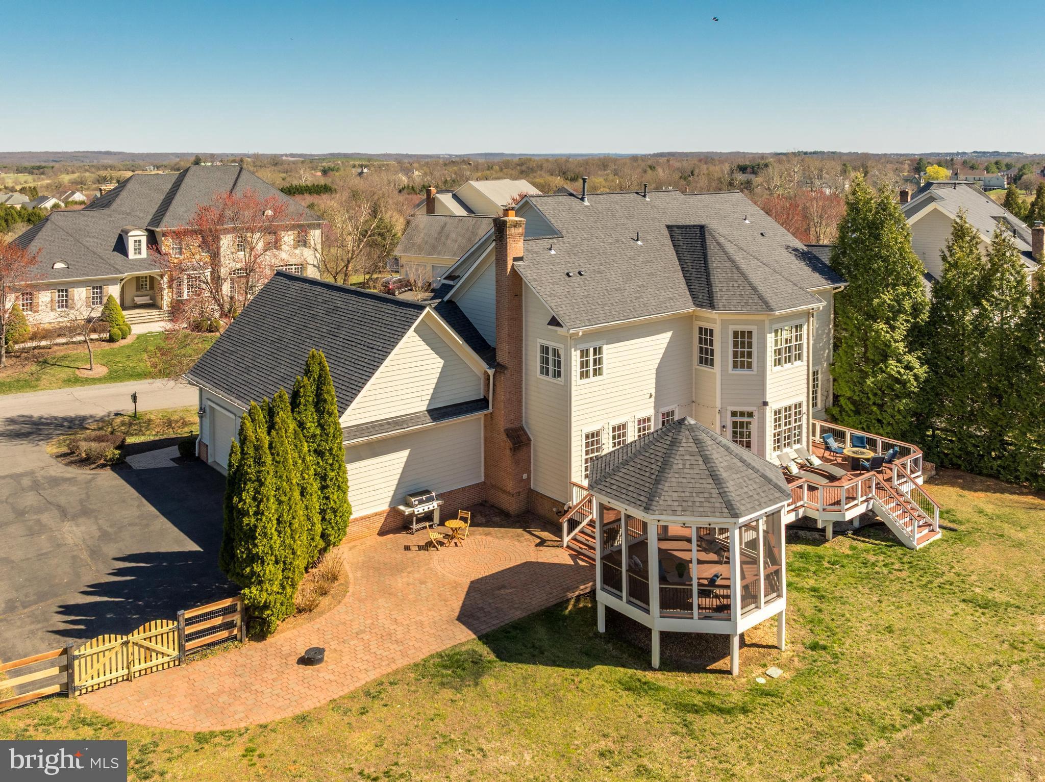 16319 Hunter Place Leesburg, VA 20176 - Photo 7 of 71 an aerial view of a house with table and chairs