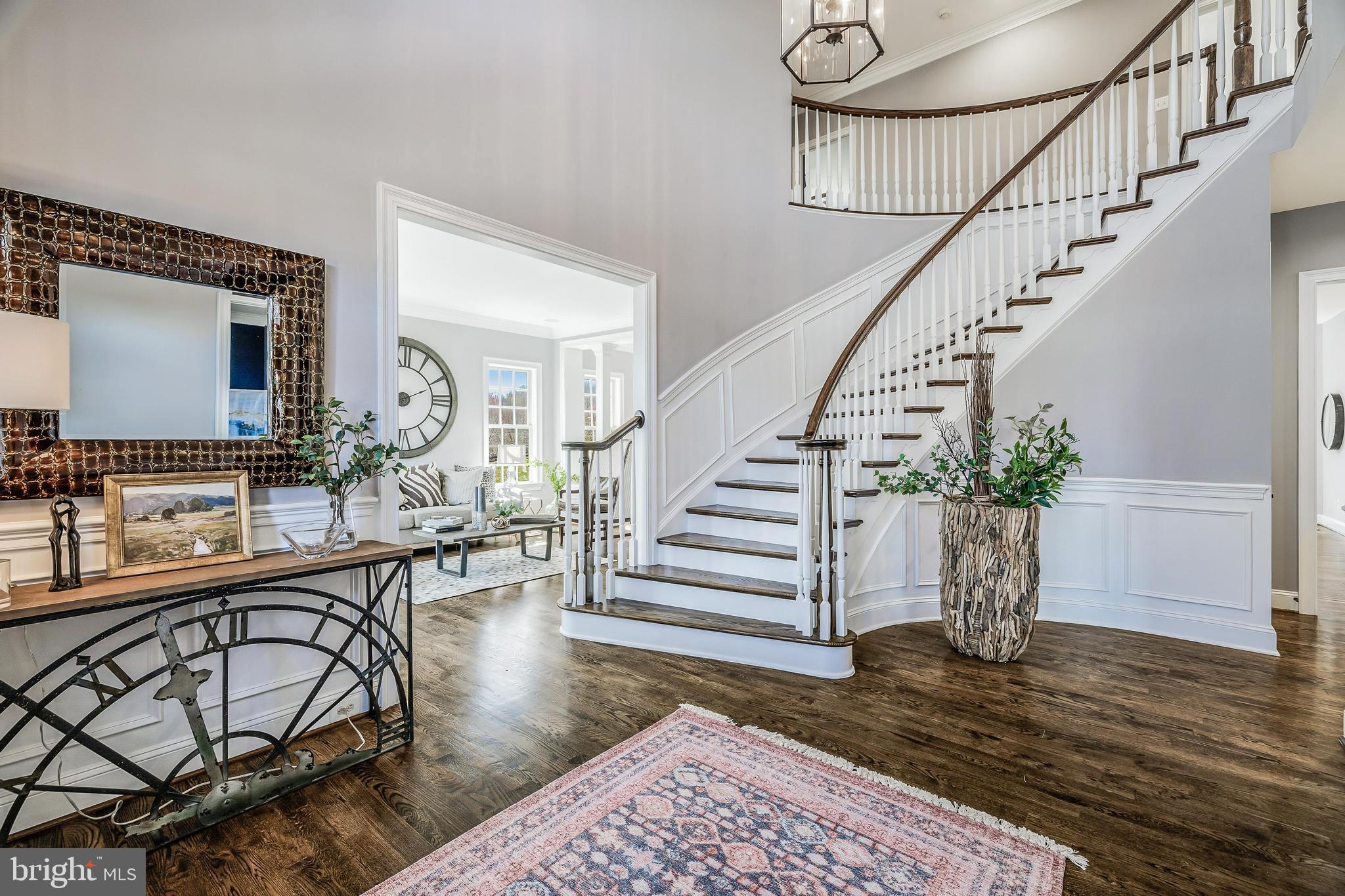 16319 Hunter Place Leesburg, VA 20176 - Photo 9 of 71 a view of entryway and hall with wooden floor