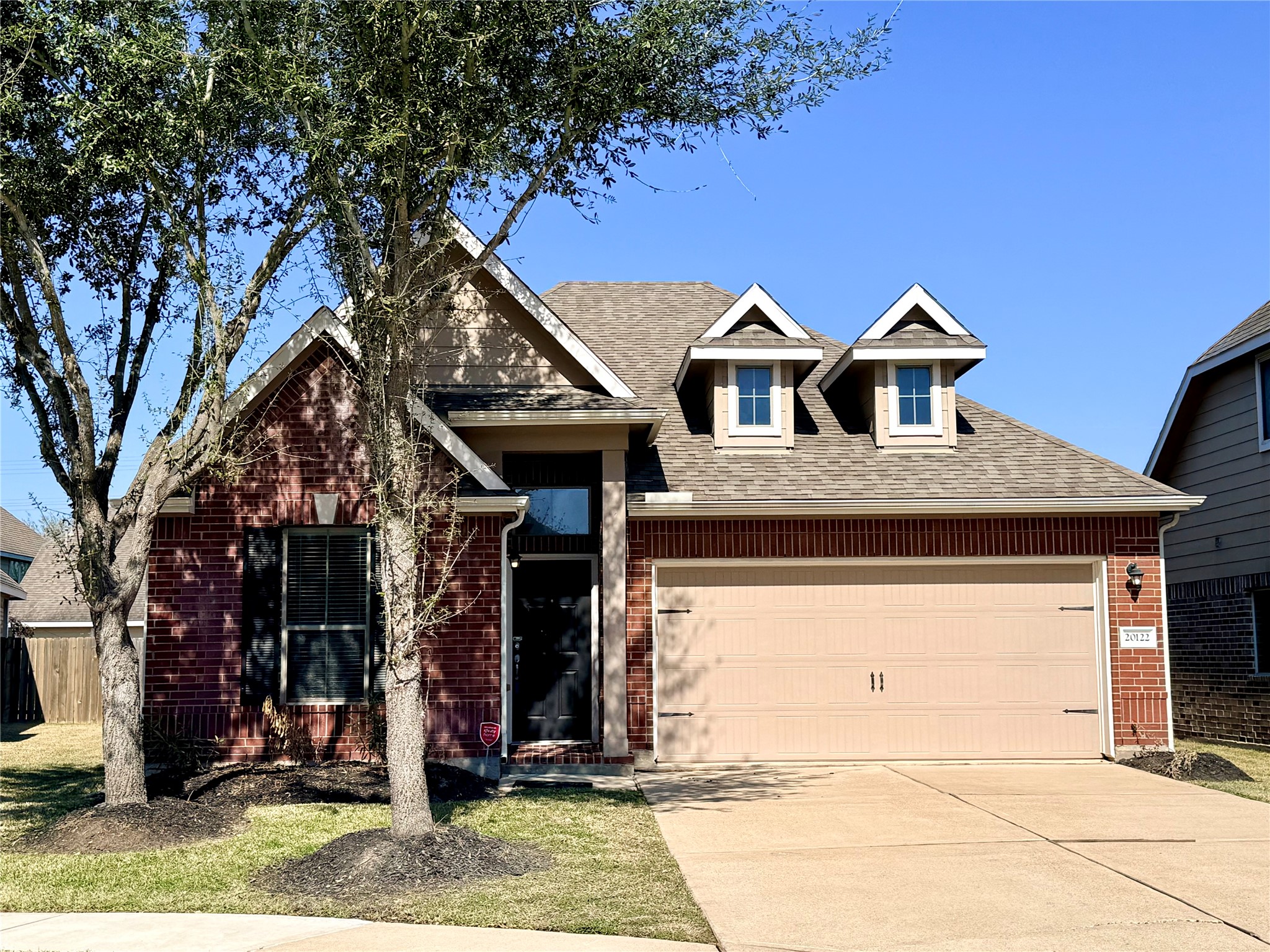 20122 Graphite Canyon Court Richmond, TX 77407 - Photo 2 of 27 Welcome to your dream home! This charming residence features a classic brick facade, inviting front yard, and modern amenities—perfect for creating lasting memories.